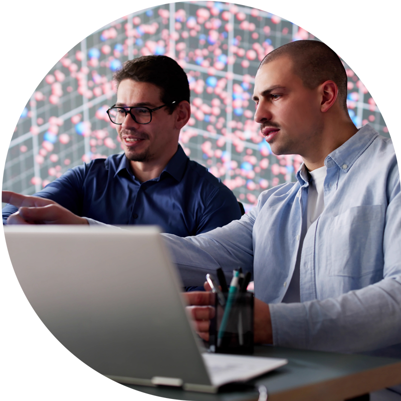 people working on a computer.