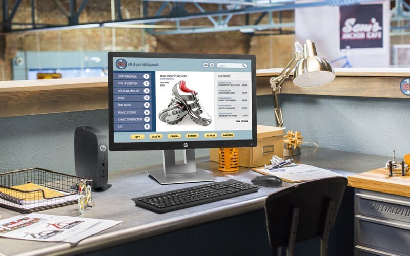 HP Desktop on a desk in a modern office