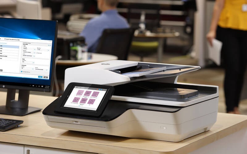 HP Scanjet Enterprise on desk in office