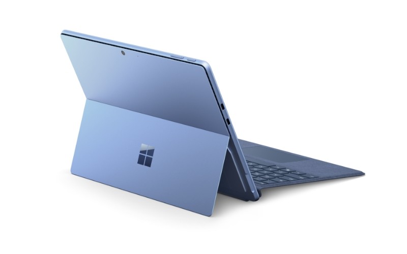 Business colleagues using a Surface Pro 9