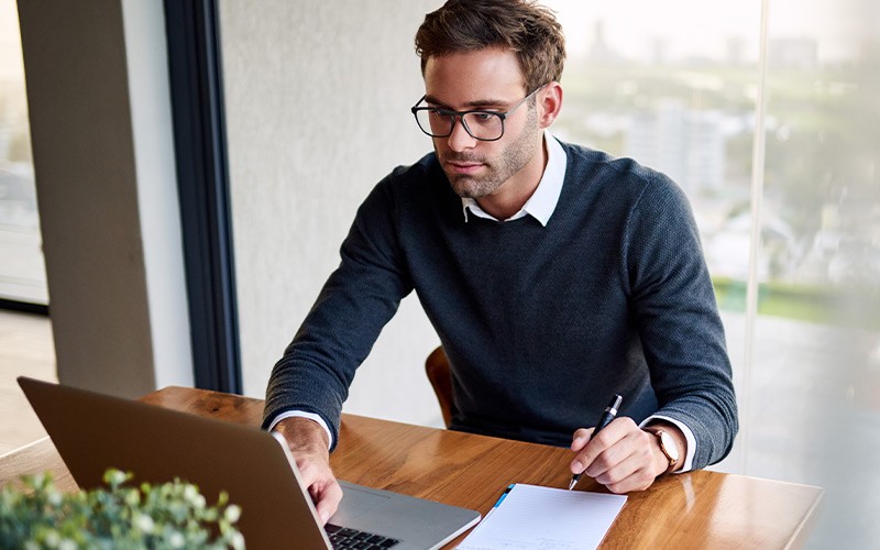 Man working remotely on a laptop