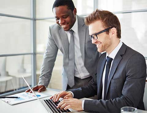 professional men around laptop
